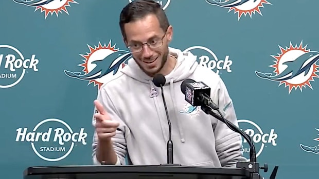Miami Dolphins coach Mike McDaniel playfully points at a reporter after responding to a question about the team's offensive output.